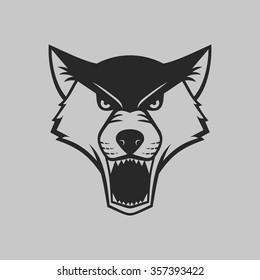 The wolf bares its teeth. Animal head logo or icon in one color. Vector illustration.