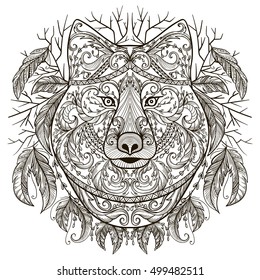 Wolf head with tribal aztec ornament in boho style. Tattoo art. Vintage hand drawn vector illustration.