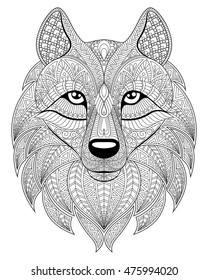 Wolf head in zentangle style. Adult antistress coloring page. Black and white hand drawn doodle for coloring book. Ethnic pattern, ornament