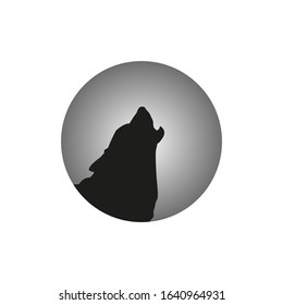 The wolf is howling at the moon.