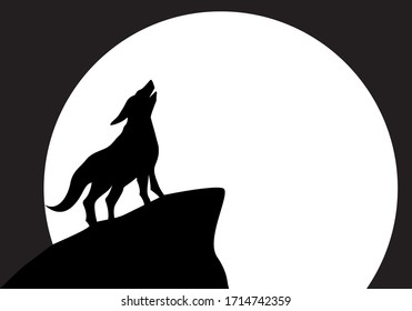 Wolf howling at the moon on a mountain