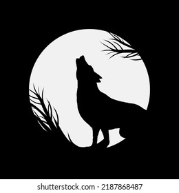 The wolf howling at the moon. Silhouette of animal in the night. Halloween background.