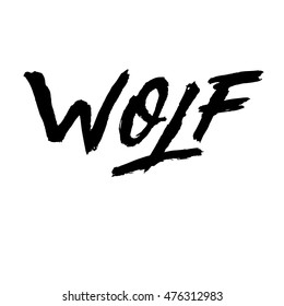 Wolf, ink hand lettering. Modern brush calligraphy. Handwritten phrase. 