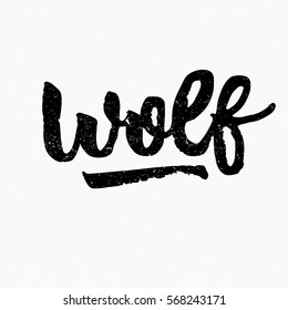 Wolf. Ink hand lettering. Modern brush calligraphy. Handwritten phrase. Inspiration graphic design typography element. Cute simple vector sign.