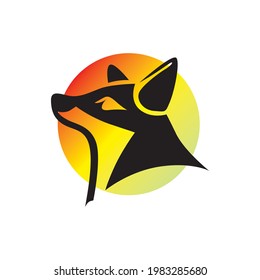 wolf logo looking at the full moon