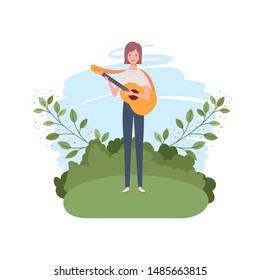 woman with acoustic guitar and branches and leaves in the background