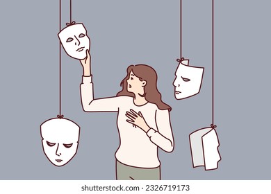 Woman actress chooses mask for performing in theater or substituting emotions to deceive interlocutor. Girl with masks, metaphor for hypocrisy and mental disorder or mental problems.