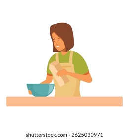 Woman is adding ingredients to a bowl while standing in the kitchen