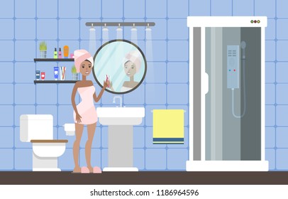 Woman after a shower standing in bathroom and brushing teeth at the mirror. Interior with bath and toilet, sink and towel. Vector flat illustration