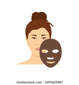 Woman apply charcoal brown mask on her face isolated on white background