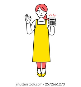 Woman in an apron holding a calculator and making an OK sign (full body)