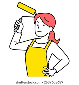 Woman in an apron holding a paint roller