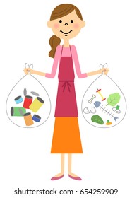 A woman of an apron to separate garbage