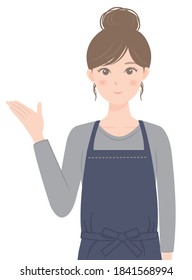 A woman in an apron who is guiding