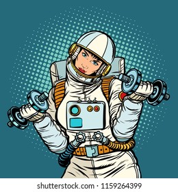 woman astronaut with dumbbells. Pop art retro vector illustration kitsch vintage drawing