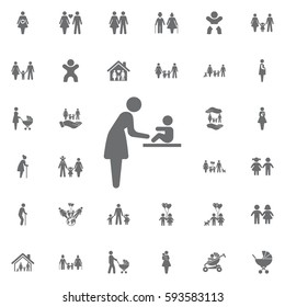 Woman and baby Changing diapers Vector icon on white background. Set of family icons