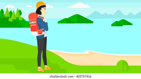 Frau mit Rucksackwanderung.
