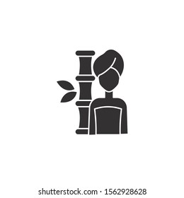 woman with bamboo of spa silhouette style icon vector illustration design