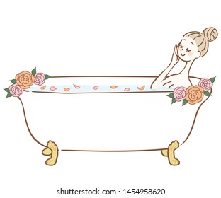 Woman bathing in a bath with rose petals