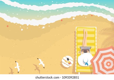 Woman with beach hat working on laptop, sitting on sun lounger on the beach with textured sand, curving sea waves, starfishes, shells and flying seagulls, from top view