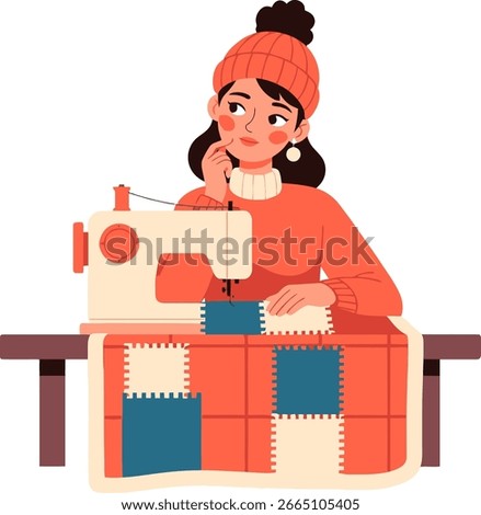 A woman in a beanie thoughtfully sews a patchwork quilt with a sewing machine.