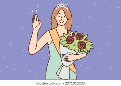 Woman beauty queen with gift bouquet of flowers waving hand thanking judge and audience for voting and winning nomination. Girl is beauty pageant queen and professional model who won television show