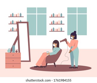 Woman in a beauty salon with a medical mask, a hairdresser in a mask, a girl in a mask doing a haircut in a barbershop, opening beauty salons after a pandemic, life after a pandemic.