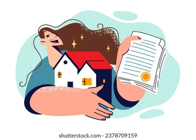 Woman become owner of house, holds certificate of ownership and miniature model of cottage. Girl owner house is happy about receiving mortgage from bank, thanks to good work of real estate broker.