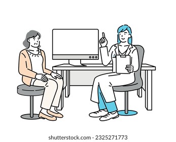 A woman being seen by a doctor in a hospital