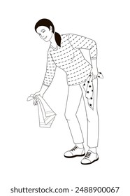 woman bent over to put laundry in the washing machine