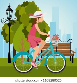 woman with bicycle in the landscape