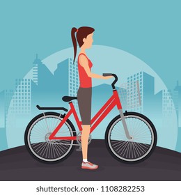 woman with bicycle in the landscape