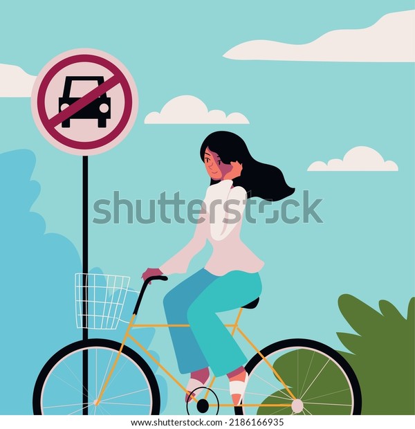 woman in bike, car\
free traffic sign, image