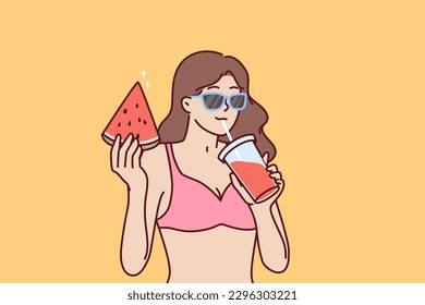 Woman in bikini drinks fruit smoothie and eats watermelon relaxing on beach or pool party. Woman in bikini and sunglasses enjoy vacation on tropical island traveling on summer vacation