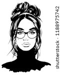 woman in black turtleneck sweater and eyeglasses