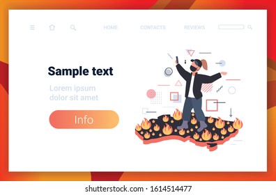 woman blogger in protective mask taking selfie photo on Australia map dangerous wildfire bushfire global warming natural disaster concept intense orange flames horizontal copy space vector