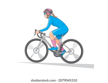 Woman in blue cycling clothes riding from side view