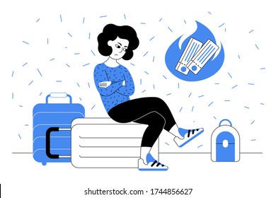 A woman in a blue sweatshirt is disappointed about her flight cancellation. She sits on her baggage. Closed borders concept.
Travel restrictions due to border shutdowns. Suspended airport lockdown. Wasted tickets