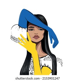woman in blue and yellow gloves