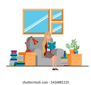woman with book in hands in living room