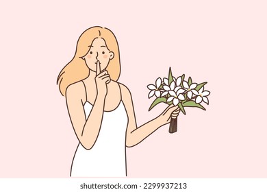 Woman with bouquet of spring flowers makes shh gesture with finger to lips, wanting to surprise loved one. Beautiful bouquet of daisies in hands of girl who loves flowers and calls for silence