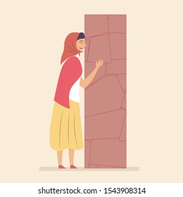 The woman bowed to the Holy stone and prayed. The girl in the scarf of the pilgrim. Religious man. Pilgrimage of Christians. Vector