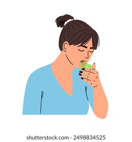 Woman breathes on her hand to check for bad breath. The stinking smell of unbrushed teeth in the form of a green cloud of smoke authors work