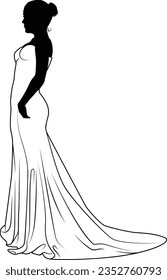 A woman bride in a bridal wedding dress in a silhouette