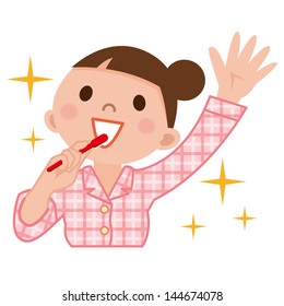 Woman brushing teeth