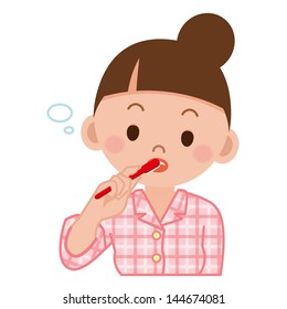 Woman brushing teeth