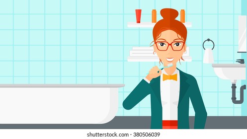 Woman brushing teeth.
