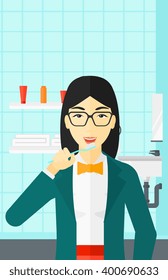 Woman brushing teeth.