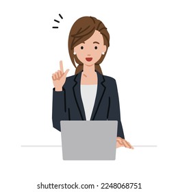 a woman in business suit style using laptop computer getting ideas with pointing hand gesture at her desk