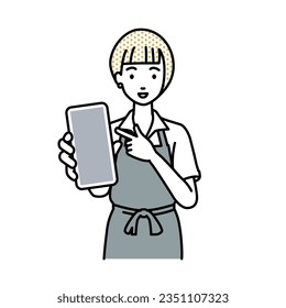 a woman in cafe apron recommending, proposing, showing and pointing smart phone mock-up screen with a smile - Powered by Shutterstock - Get 15% off with code: PIKWIZARD15